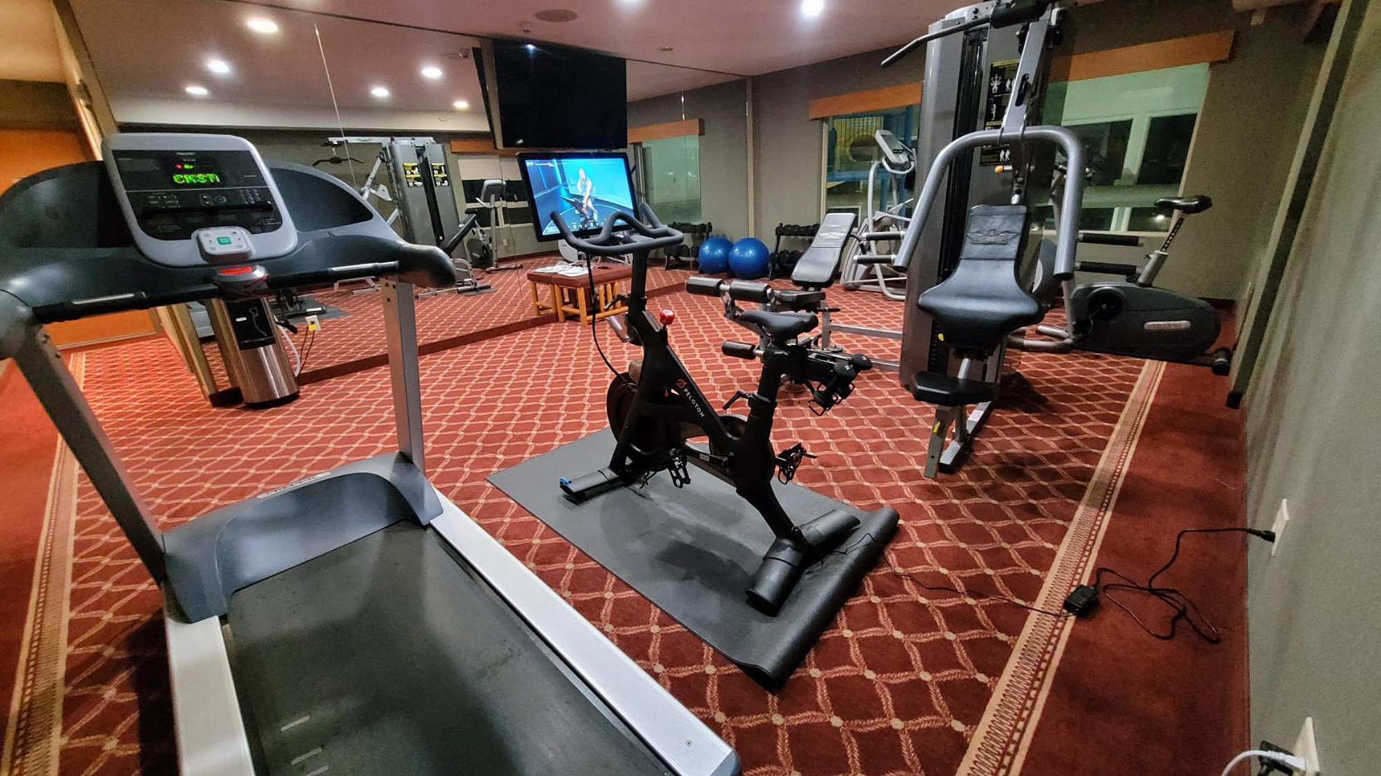 Fitness center with multiple exercise machines at Best Western Plus Valemount
