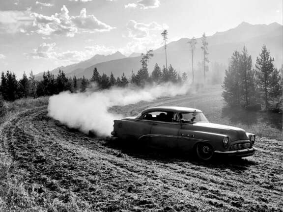 Stock car racing on a dirt track at Rocky Mountain Speedway in Valemount