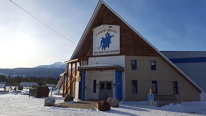 Exterior of Canoe Valley Recreation Centre with snow-covered ground in Valemount