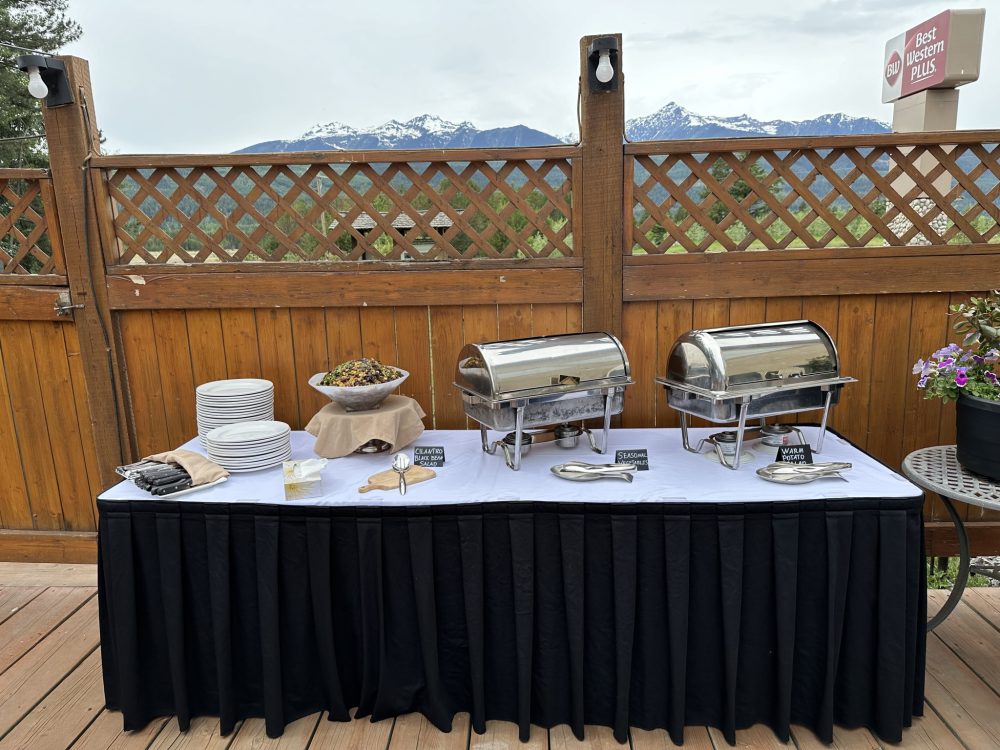 Buffet table outside on the patio at Summit Grill Valemount for conference centre catering.
